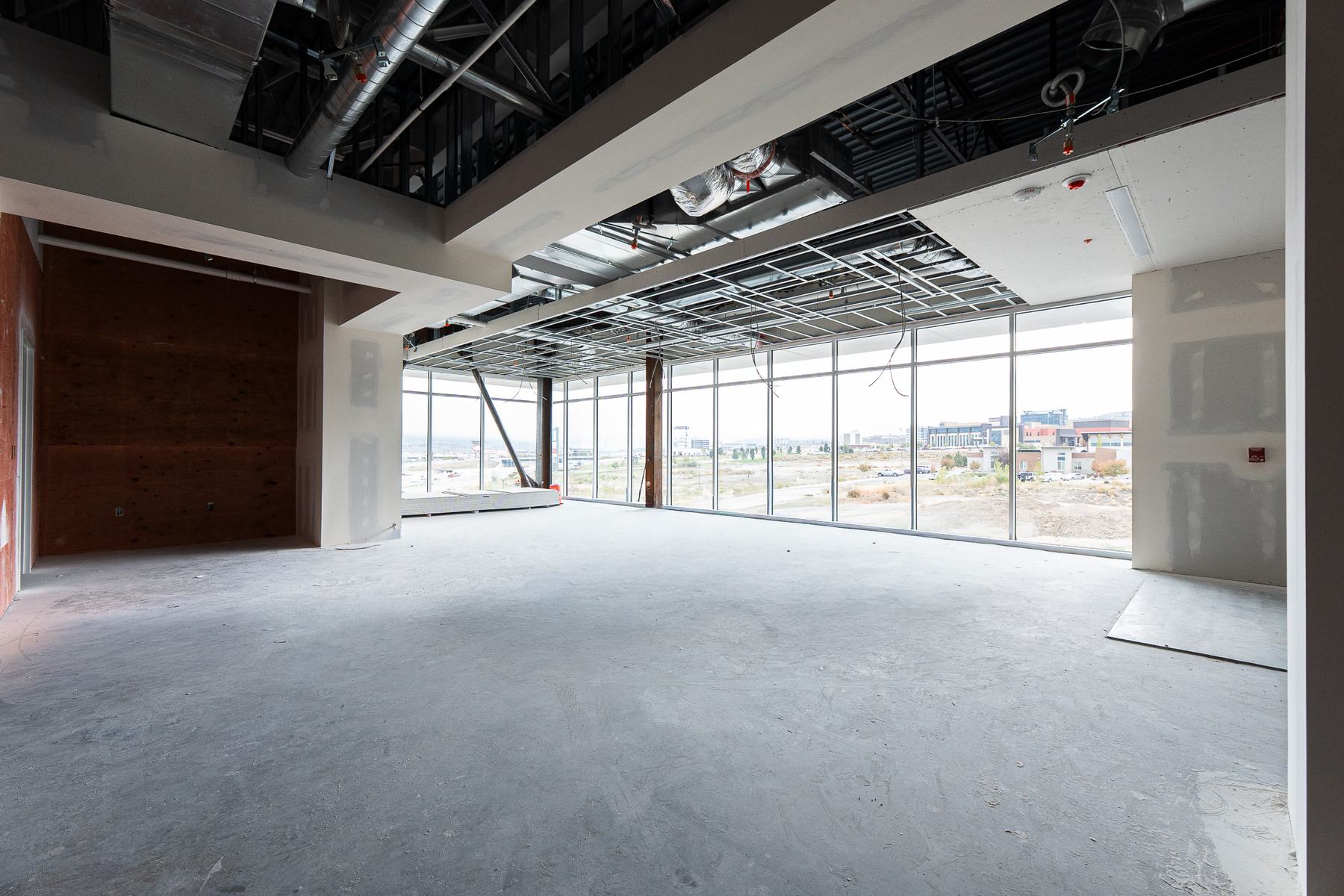 Open floor with a full-height glass wall