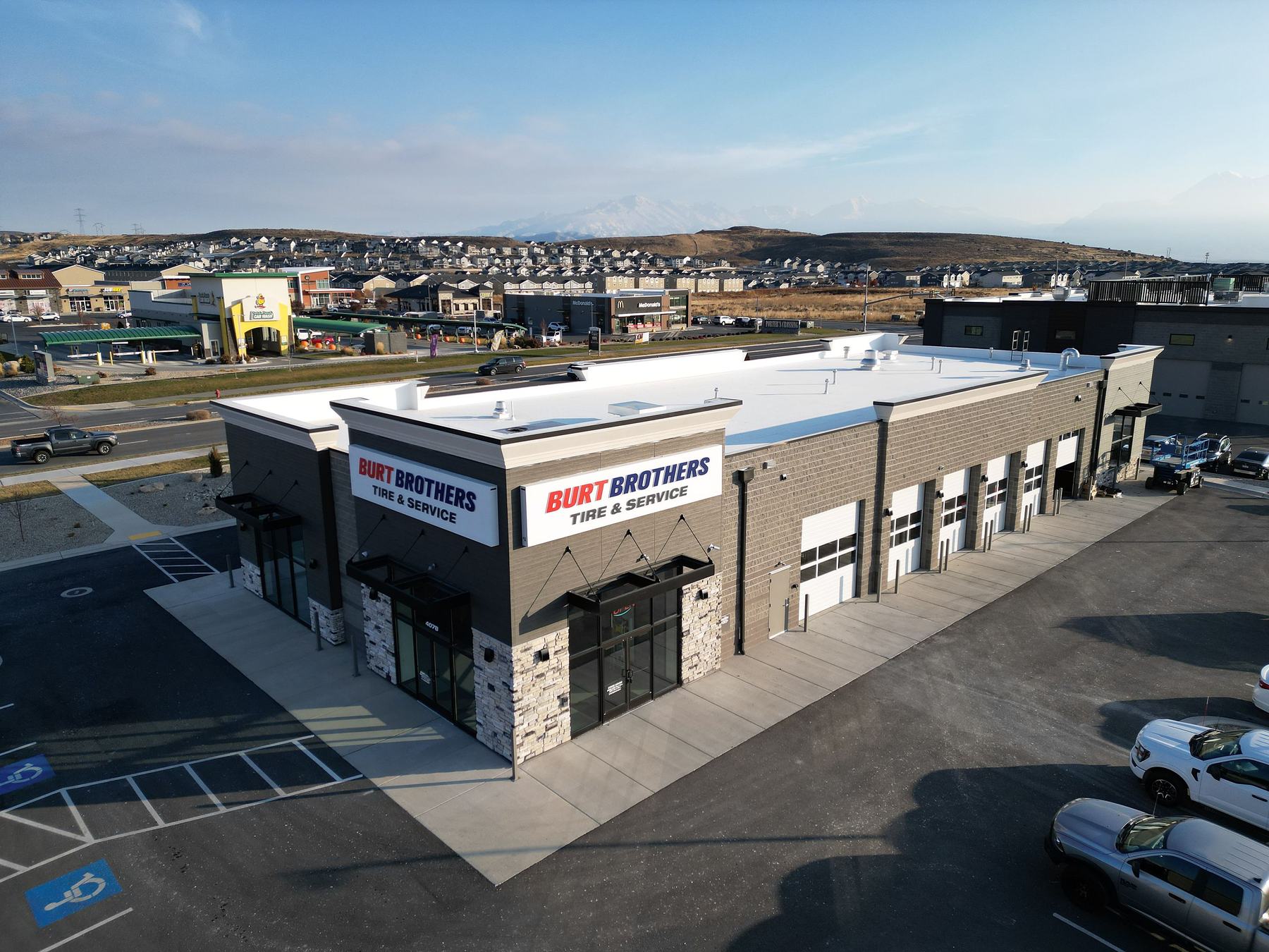Aerial view of the building and lot
